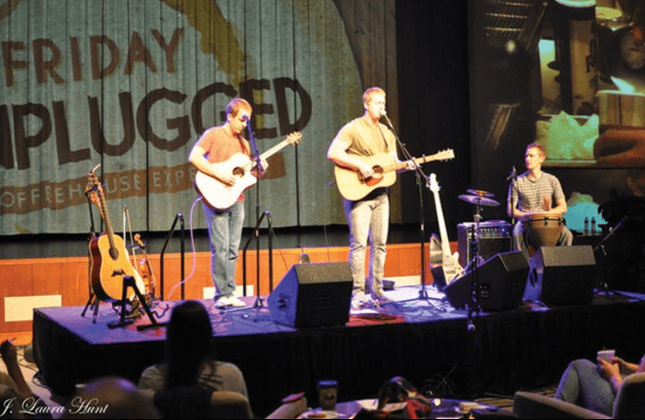 Scott and his two brothers performing in their band Cliftones, circa 2010